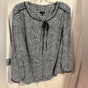 Talbots long sleeve black and white floral blouse.  Black trim and front tie.
